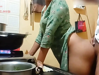 See this Indian Milf with a ample booty get down and dirty in the kitchen