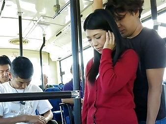 Black-haired Aimi Nagano gets her taut crevice spread in a bus ride